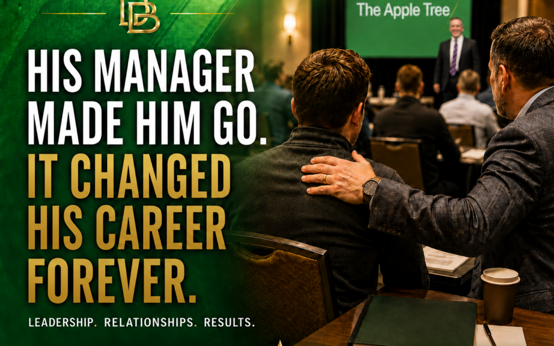 A manager's hand on a teammate's shoulder at one of Damian Boudreaux's seminars.